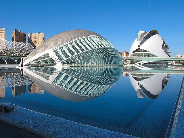 The Hemisfèric and the Palau de les Arts reflected in the water of the City of Arts and Sciences